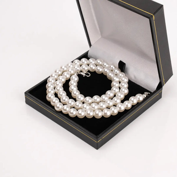 Collier de perles pour homme dans écrin