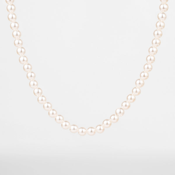 Collier de perles pour homme porté