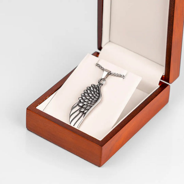 Pendentif aile argent pour homme dans un écrin en bois